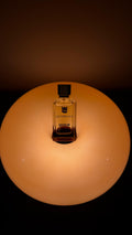  QUIMBAYA QAMAR Eau de Parfum 100ml luxury fragrance bottle in a moonlit tropical setting, crafted in Abu Dhabi by a Dutch fragrance house.